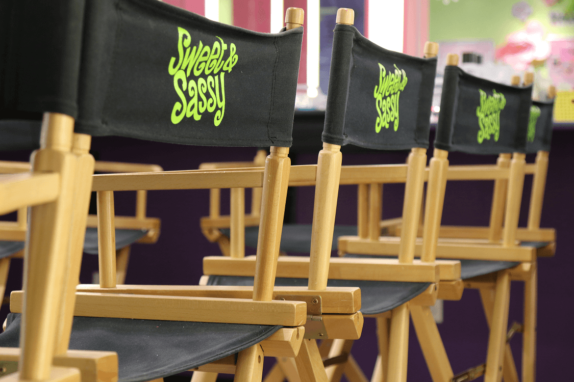 A row of empty directors chairs at Sweet & Sassy The Woodlands